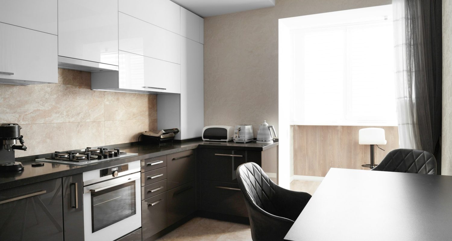 Minimalist kitchen interior with built-in electronics